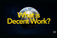 Image of Earth from space with the bold yellow text "What is Decent Work?" overlaid, representing the ILO's focus on fair and productive employment.